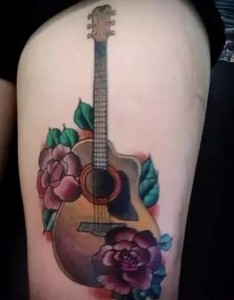 吉他纹身 聆听世界的声音